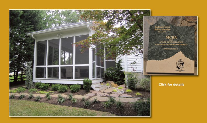 A charming screened porch with stone steps surrounded by greenery.