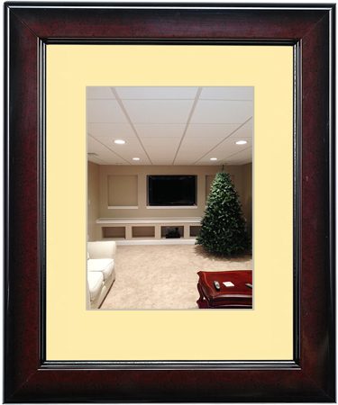 Living room with TV, fireplace, and Christmas tree.