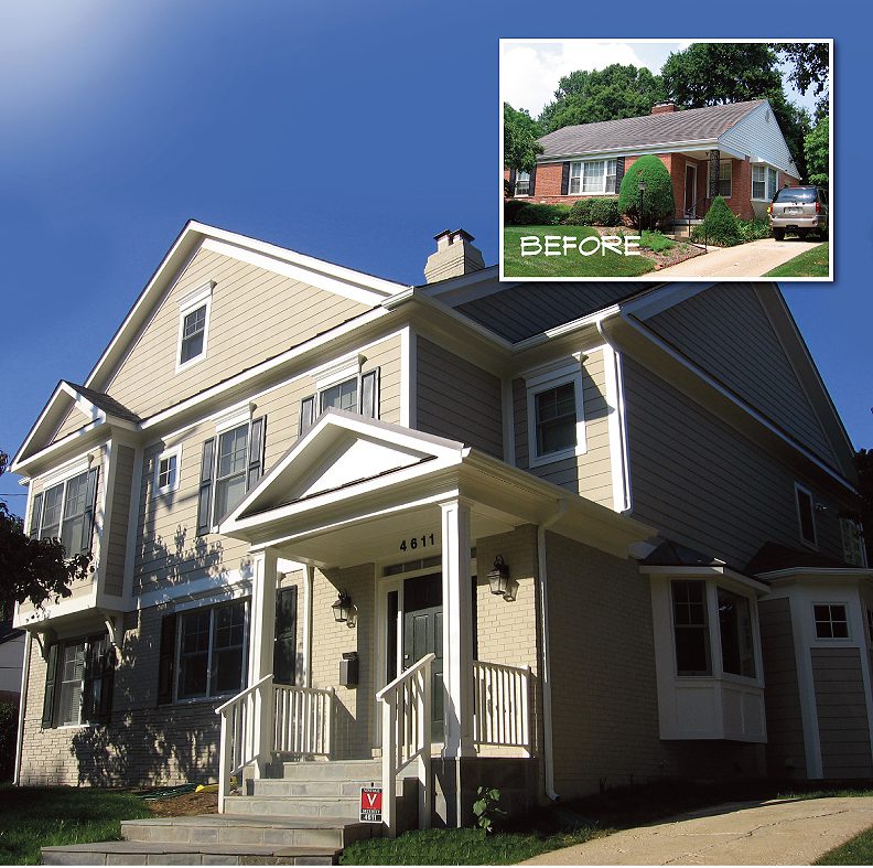 Large beige two-story house with a covered front porch and a chimney.