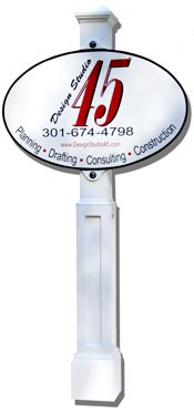 Tall white signpost with business contact details.