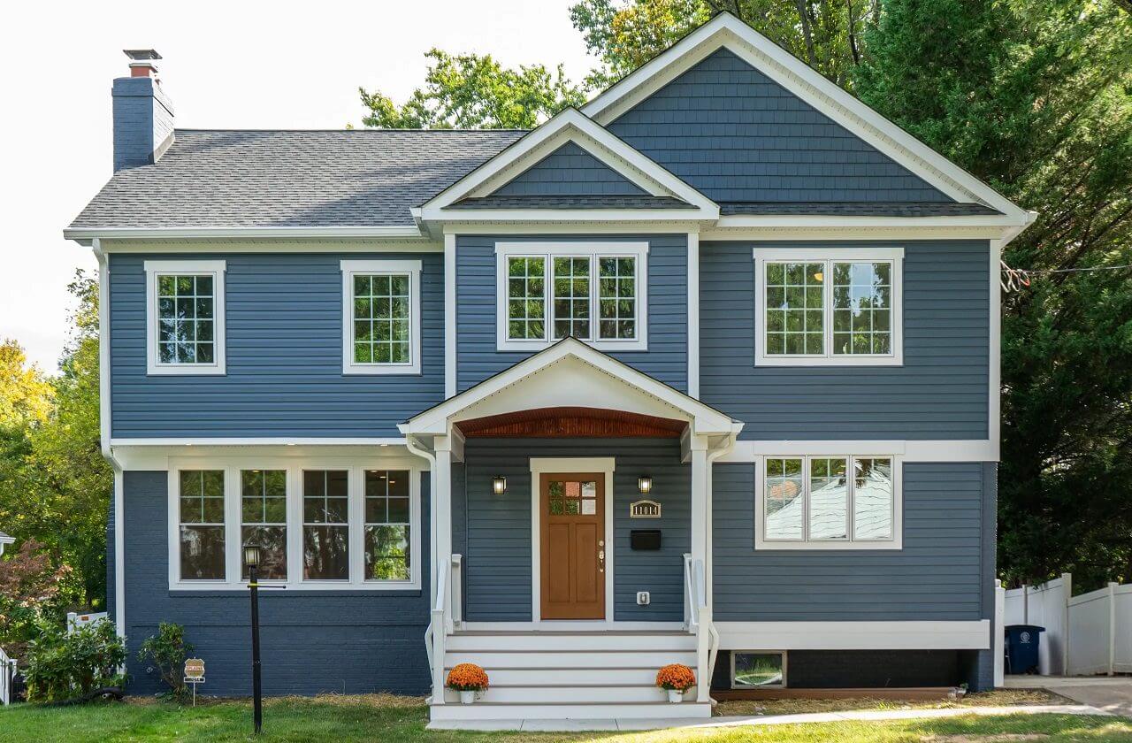 Blue two-story house with front porch